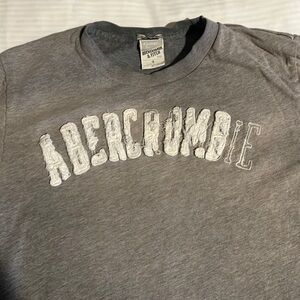 Abercrombie & Fitch short sleeved size small gray and white t-shirt. Raised logo